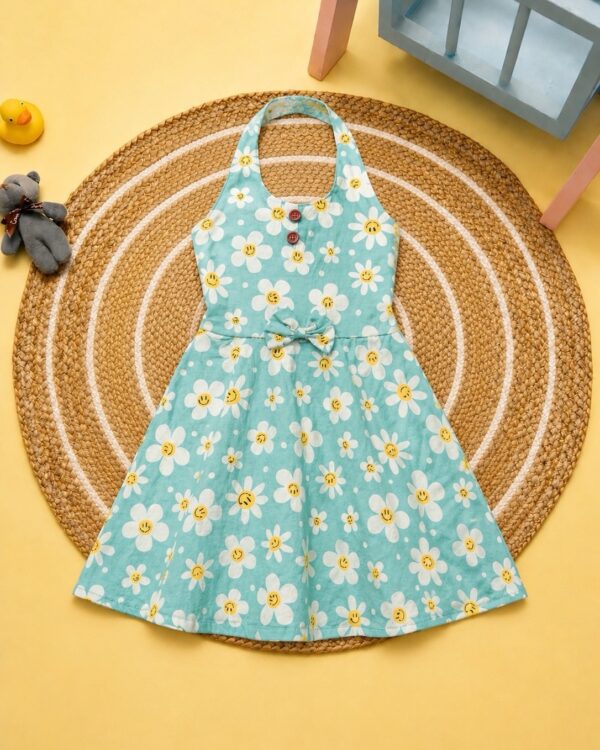 Girls green floral frock with smiley print